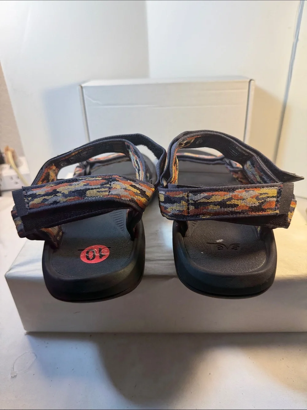Teva Men’s Black Sandals with Orange and Yellow Patterned Straps